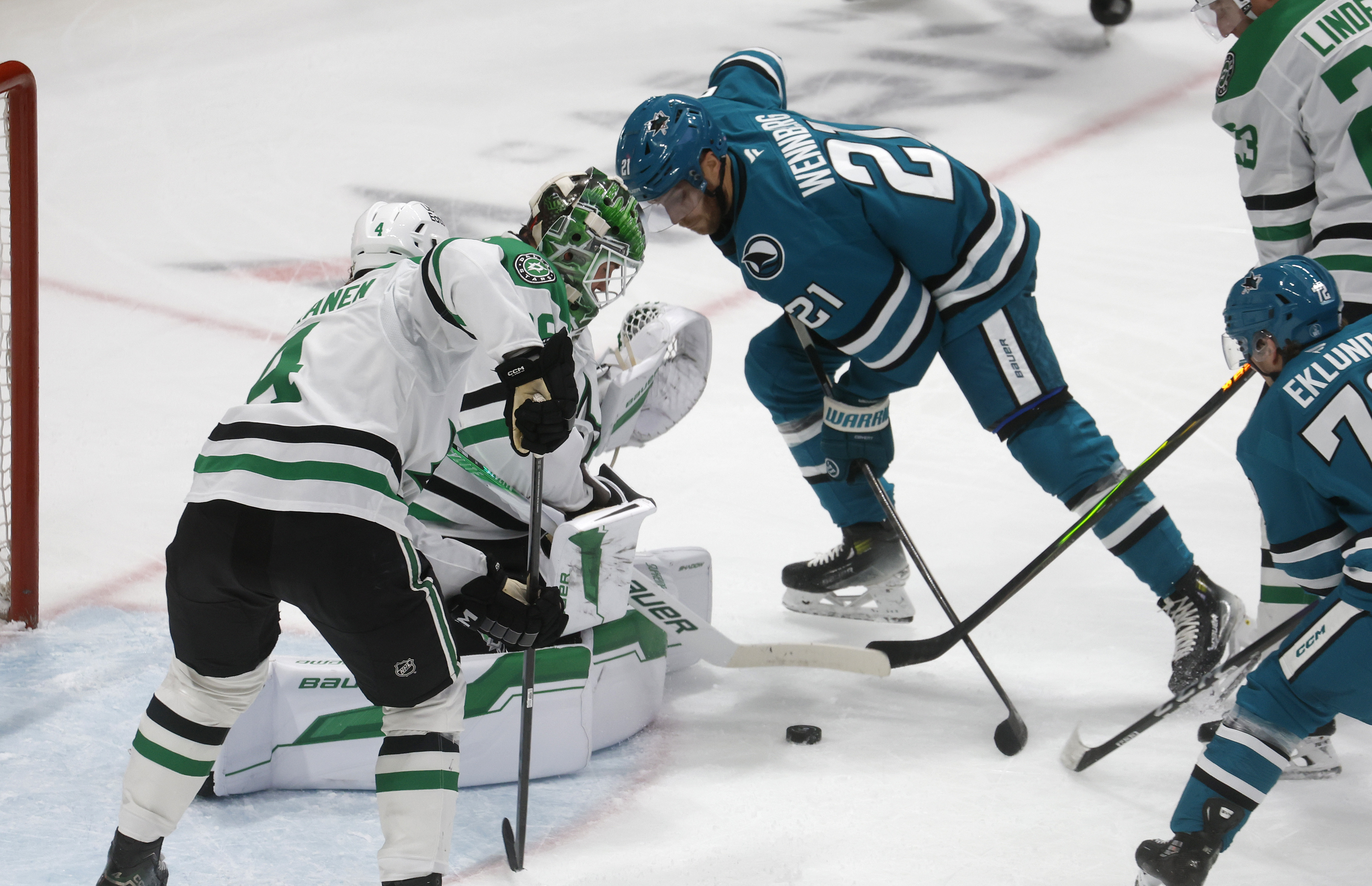 San Jose Sharks’ Alexander Wennberg (21) canât get a shot...