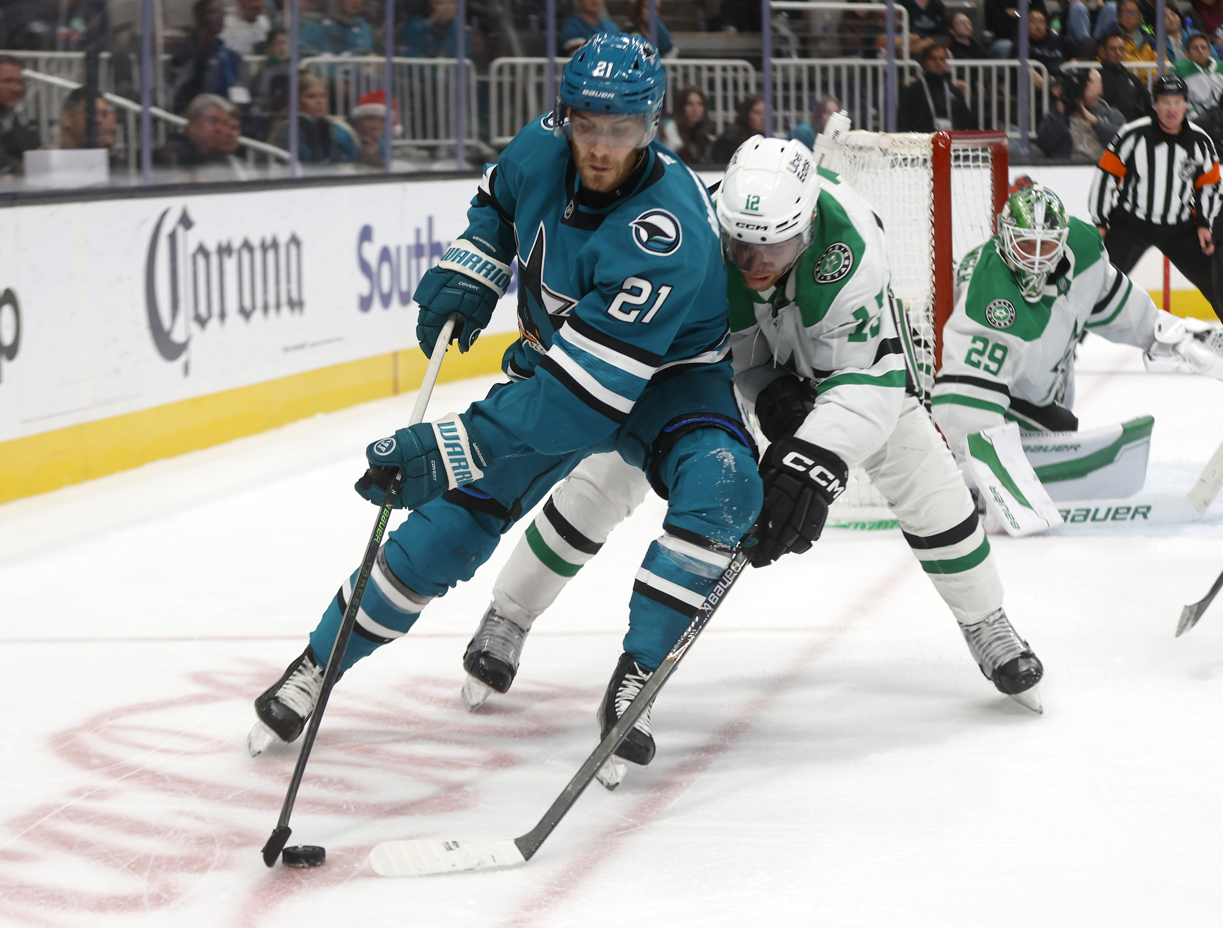 San Jose Sharks’ Alexander Wennberg (21) controls the puck against...