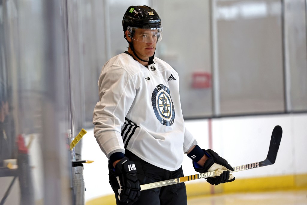 Bruins' Nikita Zadorov chugs beer "for Boston"