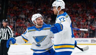 St. Louis Blues Nathan Walker, left, congratulates Cam Fowler (17) after his goal against the New Jersey Devils during the first period of an NHL hockey game, Wednesday, Nov. 26, 2025, in Newark, N.J. (AP Photo/Noah K. Murray)