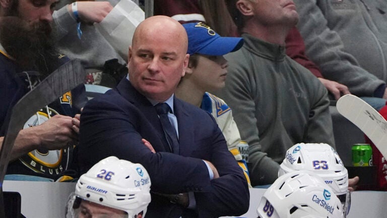 St. Louis Blues head coach Jim Montgomery () in the second period of an NHL hockey game Saturday, March 29, 2025, in Denver.