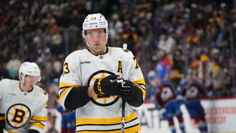 Boston Bruins defenseman Charlie McAvoy (73) in the third period of an NHL hockey game Saturday, Oct. 18, 2025, in Denver.
