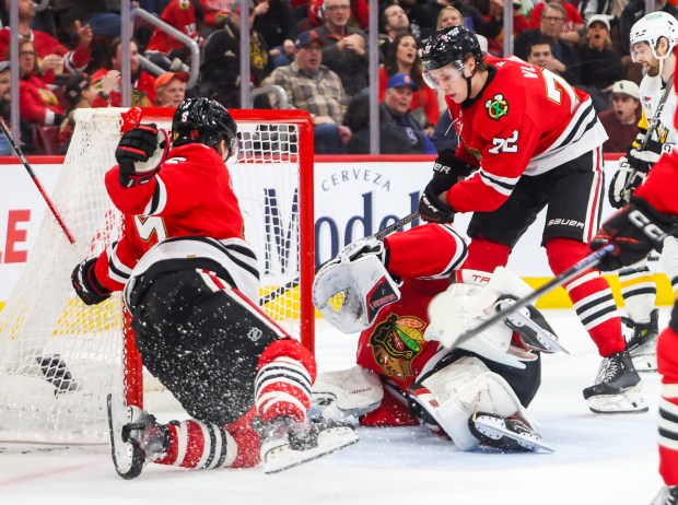 Blackhawks goaltender Arvid Soderblom (40) attempts to save a puck as it entered the net and fails during the second period against the Pittsburgh Penguins, Dec. 28, 2025, at the United Center. (Dominic Di Palermo/Chicago Tribune)