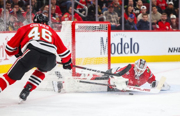Blackhawks goaltender Arvid Soderblom (40) saves a goal during the second period against the Pittsburgh Penguins, Dec. 28, 2025, at the United Center. (Dominic Di Palermo/Chicago Tribune)
