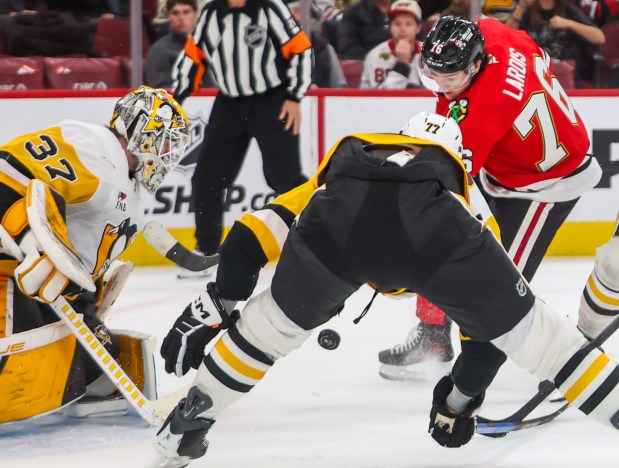 Blackhawks left wing Nick Lardis (76) shoots on goal during the third period against the Pittsburgh Penguins, Dec. 28, 2025, at the United Center. (Dominic Di Palermo/Chicago Tribune)