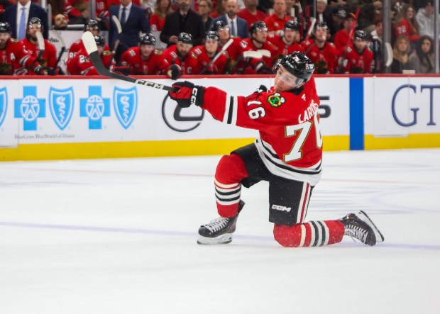 Blackhawks left wing Nick Lardis (76) shoots on goal during the first period against the Pittsburgh Penguins, Dec. 28, 2025, at the United Center. (Dominic Di Palermo/Chicago Tribune)