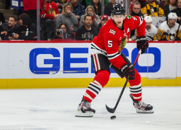 Blackhawks defenseman Connor Murphy (5) handles the puck during the first period against the Pittsburgh Penguins, Dec. 28, 2025, at the United Center. (Dominic Di Palermo/Chicago Tribune)