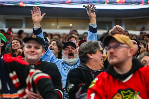 A Pittsburgh Penguins fan cheers after the Penguins scored a goal during the first period against the Blackhawks, Dec. 28, 2025, at the United Center. (Dominic Di Palermo/Chicago Tribune)