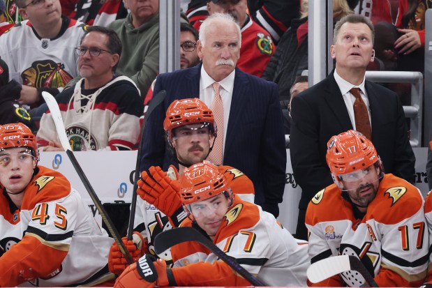 Ducks coach Joel Quenneville looks on against the Blackhawks during the first period Sunday, Nov. 30, 2025, at the United Center. (Michael Reaves/Getty Images)