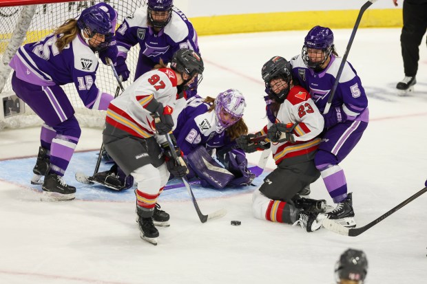 Minnesota Frost goaltender Nicole Hensley (29) scrambles as the puck is loose in front of the net in the second period during the PWHL Takeover Tour at Allstate Arena on Sunday, Dec. 21, 2025. (Eileen T. Meslar/Chicago Tribune)