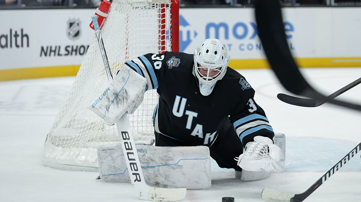 Utah Hockey Club goaltender Connor Ingram (39) jumps on a loose puck during the first period against the St. Louis Blues at Delta Center.
