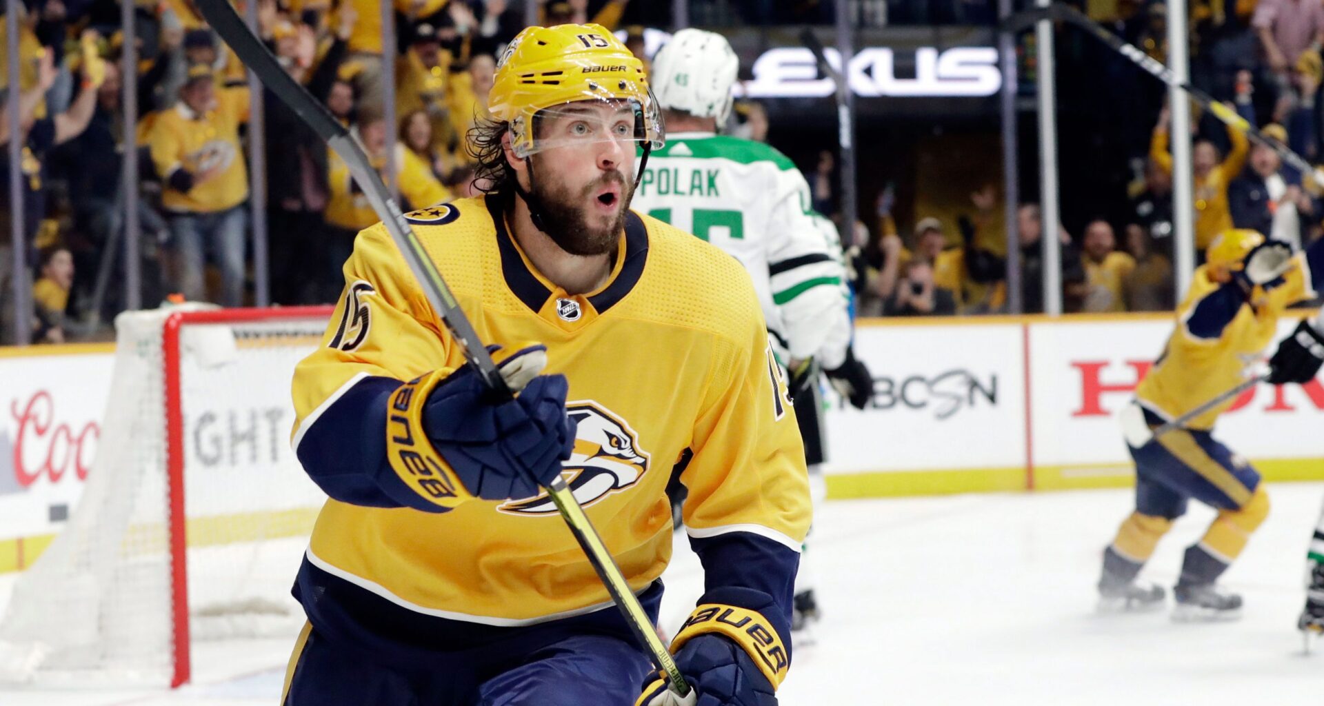 Craig Smith celebrates after scoring. (Mark Humphrey / AP)