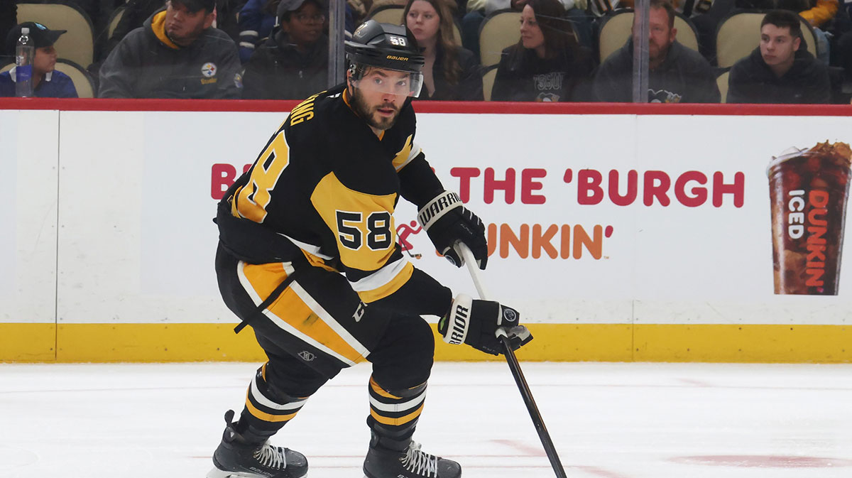 Pittsburgh Penguins defenseman Kris Letang (58) handles the puck against the Toronto Maple Leafs during the second period at PPG Paints Arena.