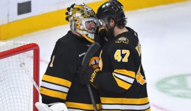 Boston Bruins goaltender Jeremy Swayman (1) celebrates with center Mark Kastelic (47) after the Bruins beat the New Jersey Devils in an NHL hockey game, Saturday, Dec. 6, 2025, in Boston.