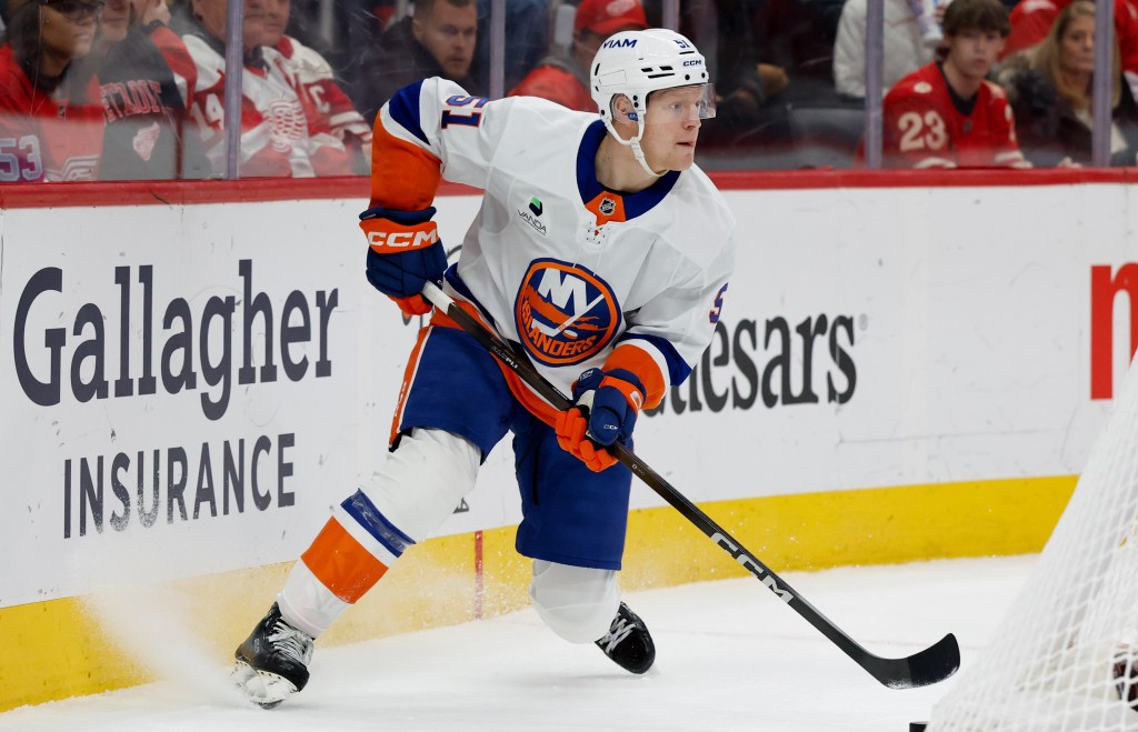 Emil Heineman skates with the puck during the Islanders' loss to the Red Wings on Dec. 16, 2025.
