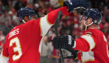 Seth Jones and Sam Bennett celebrate.