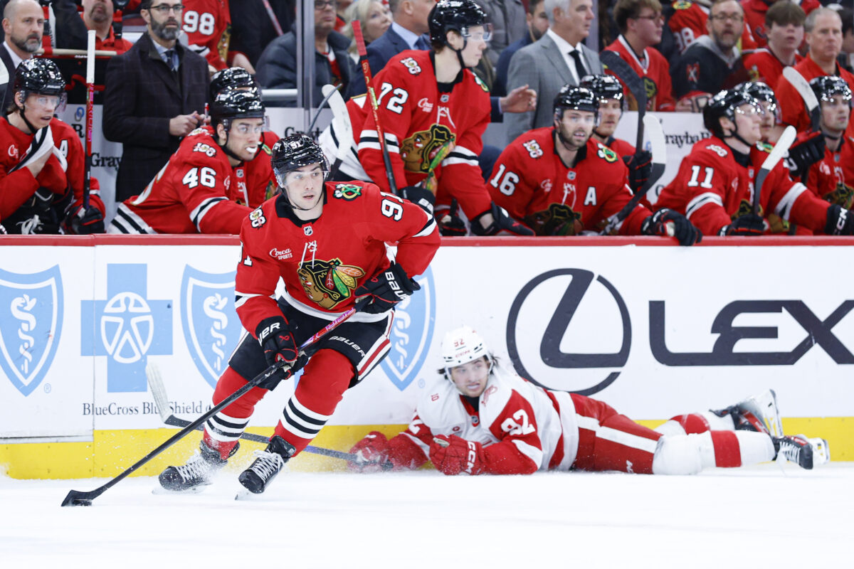Dec 13, 2025; Chicago, Illinois, USA; Chicago Blackhawks center Frank Nazar (91) looks to pass the puck against the Detroit Red Wings during the second period at United Center. 