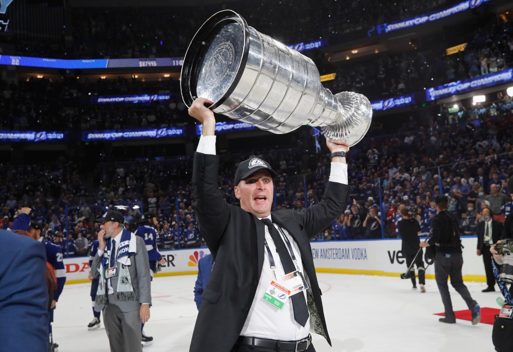 Mathieu Darche of the Tampa Bay Lightning celebrates with the Stanley Cup following the victory over the Montreal Canadiens in Game Five of the 2021 NHL Stanley Cup Final at the Amalie Arena on July 07, 2021 in Tampa, Florida.