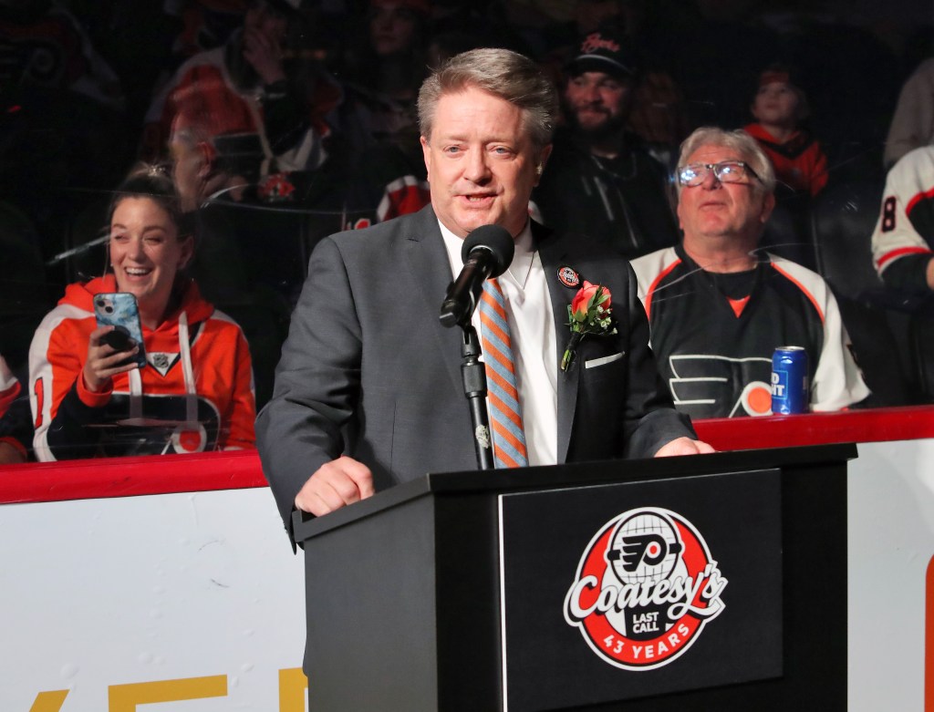 Tim Saunders host a pregame ceremony honoring Steve Coates, 43-year career as member of the broadcast team for the Philadelphia Flyers at the Wells Fargo Center on April 1, 2023.