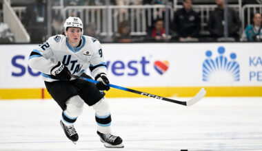 SAN JOSE, CALIFORNIA - DECEMBER 01: Logan Cooley #92 of the Utah Mammoth controls the puck against the San Jose Sharks in the third period at SAP Center on December 01, 2025 in San Jose, California. (Photo by Eakin Howard/Getty Images)