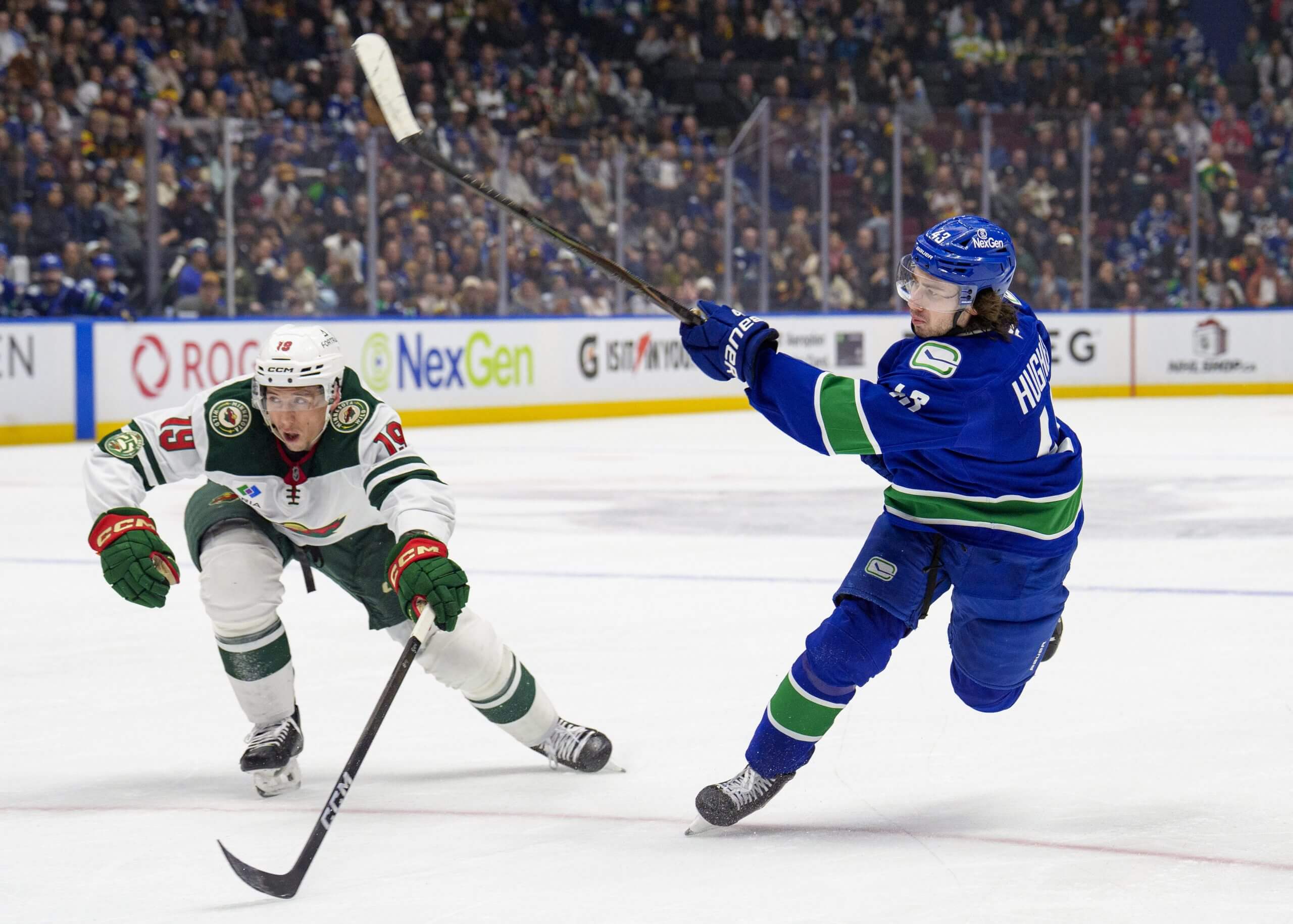Vancouver's Quinn Hughes fires during a game against the Minnesota Wild.