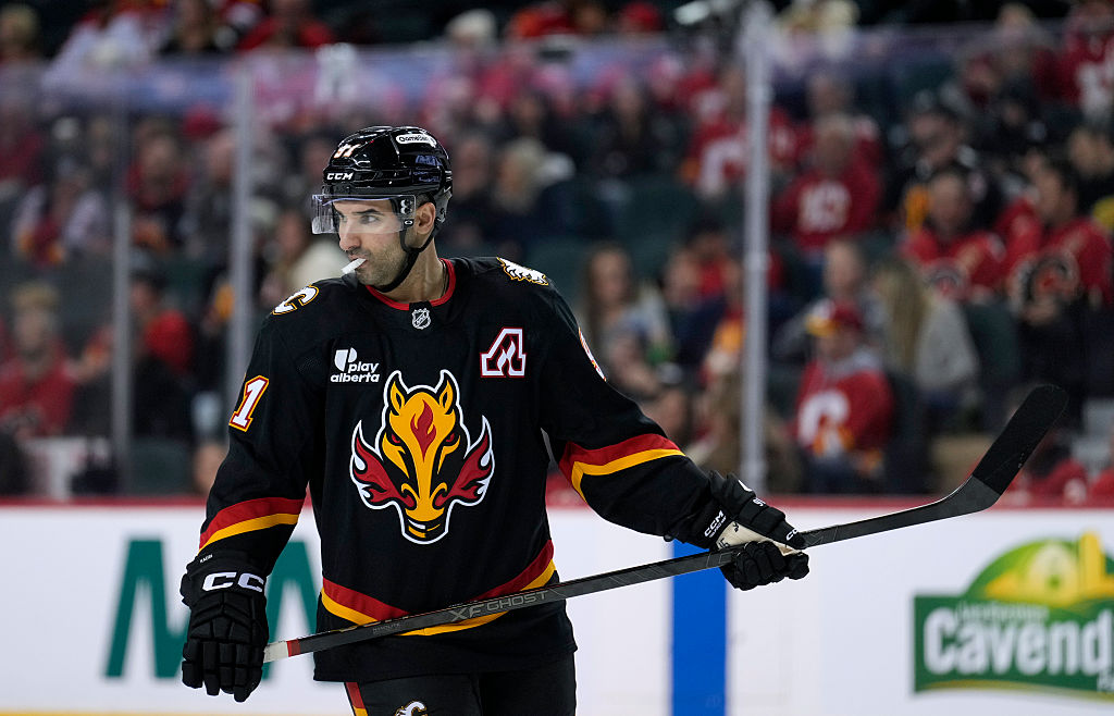 CALGARY, CANADA - DECEMBER 06: Nazem Kadri #91 of the Calgary Flames prepares for a face-off against the Utah Mammoth at the Scotiabank Saddledome on December 06, 2025 in Calgary, Canada. (Photo by Leah Hennel/Getty Images)
