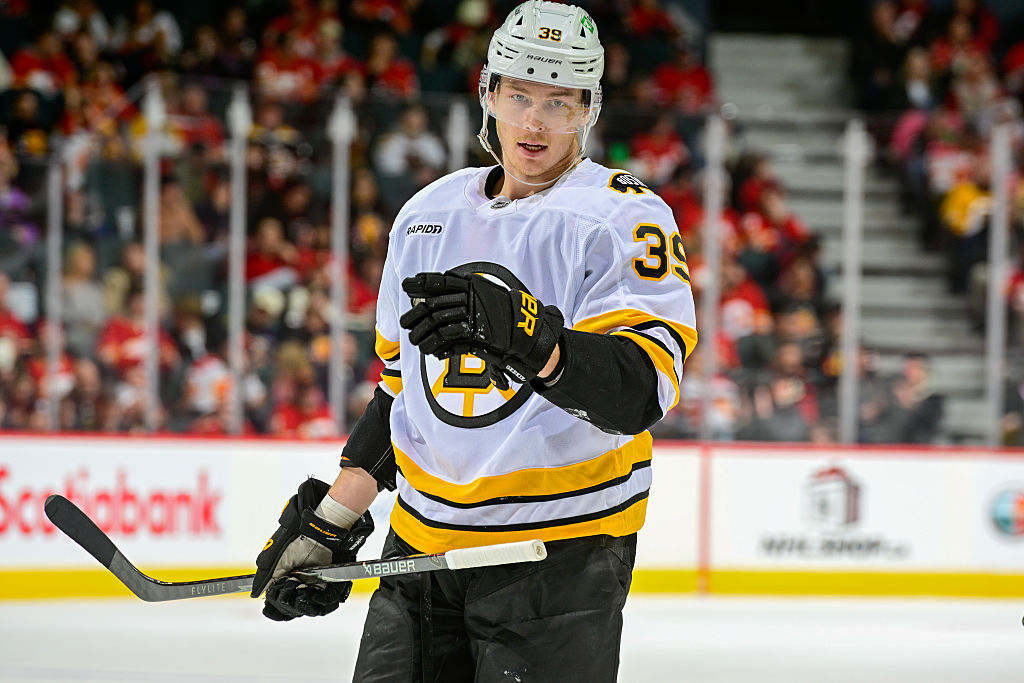 CALGARY, ALBERTA - DECEMBER 29: Morgan Geekie #39 of the Boston Bruins skates against the Calgary Flames at the Scotiabank Saddledome on December 29, 2025 in Calgary, Alberta. (Photo by Terence Leung/NHLI via Getty Images)