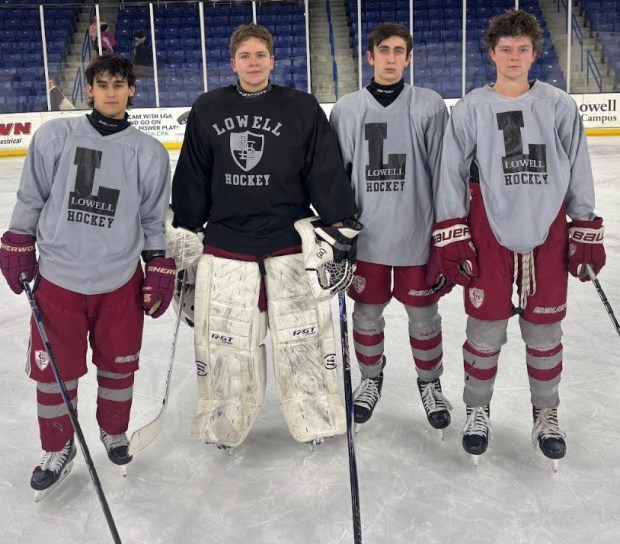 Leading the Lowell High/Lowell Catholic boys hockey team into the season are seniors, from left, Matteo Gentile, Grady Avila, Jeremy Dion and Shane Peters. (Courtesy photo)