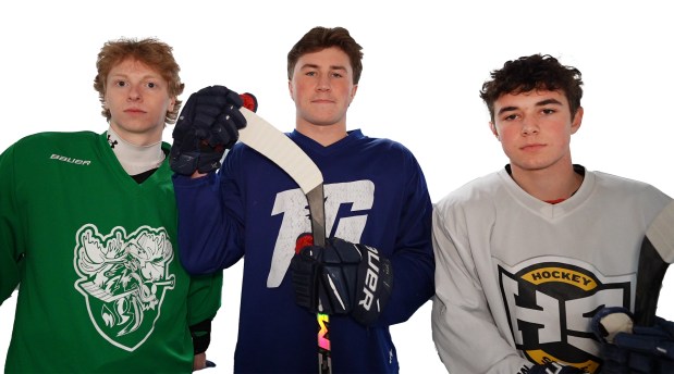 Captaining the Alvirne High boys hockey team this season are, from left, Landon Briand, Brandon Ganas and Chris Bozza. (Courtesy photo)