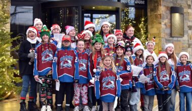 PHOTO: Hockey team hits the right notes while spreading joy downtown