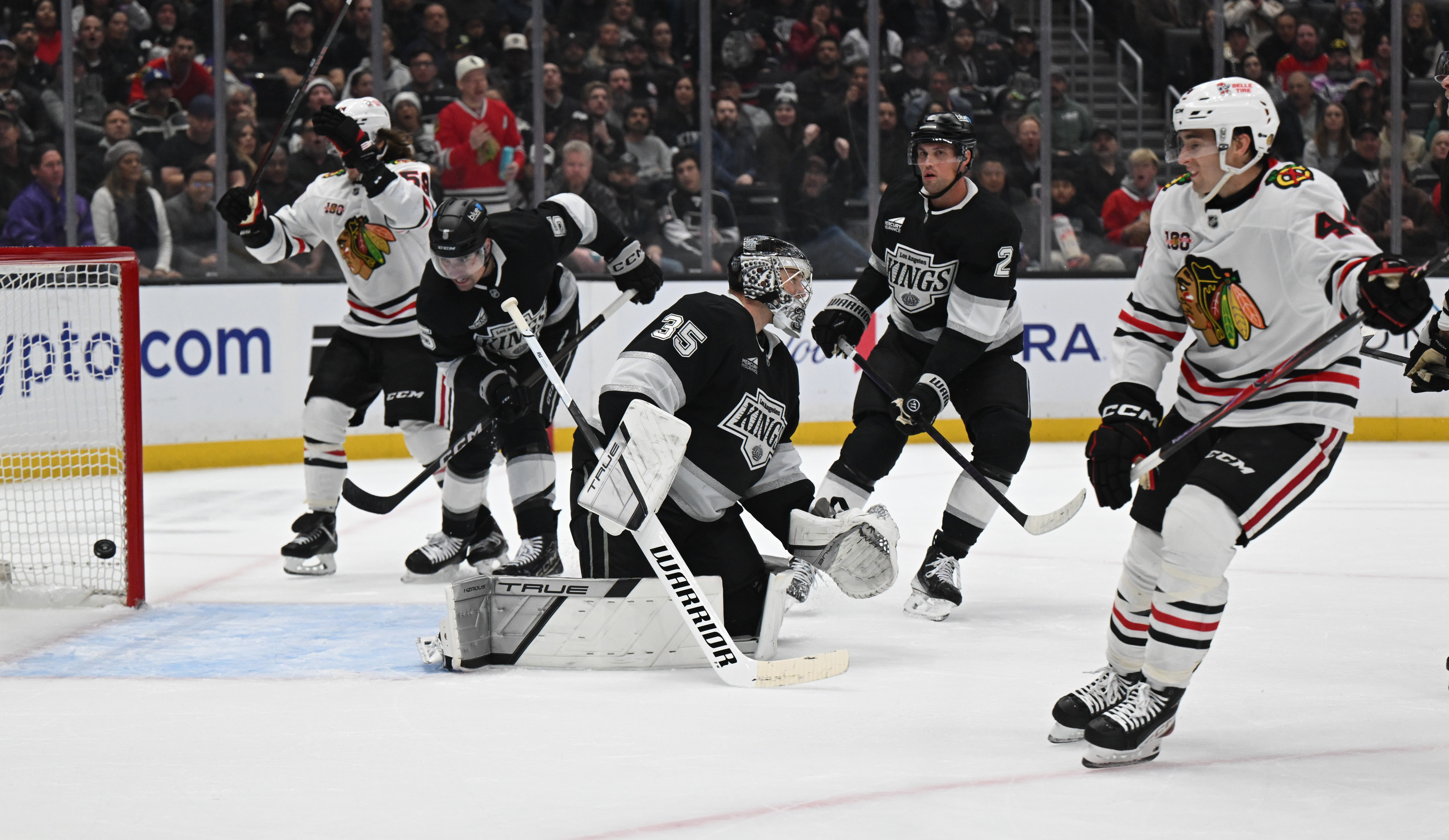 Blackhawks Wyatt Kaiser (44) scores on Kings goalie Darcy Kuemper...