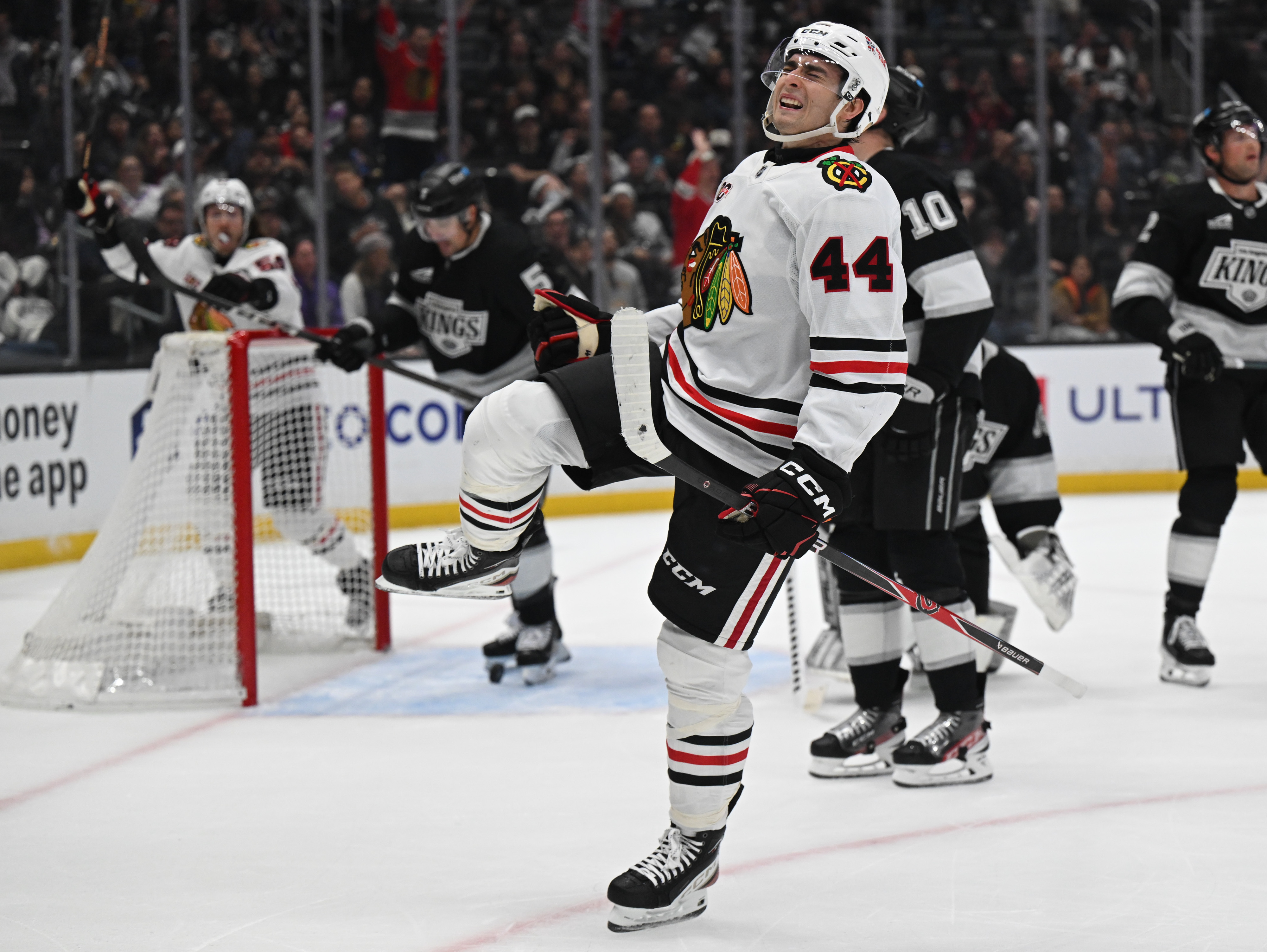 Blackhawks Wyatt Kaiser (44) scores on Kings goalie Darcy Kuemper...
