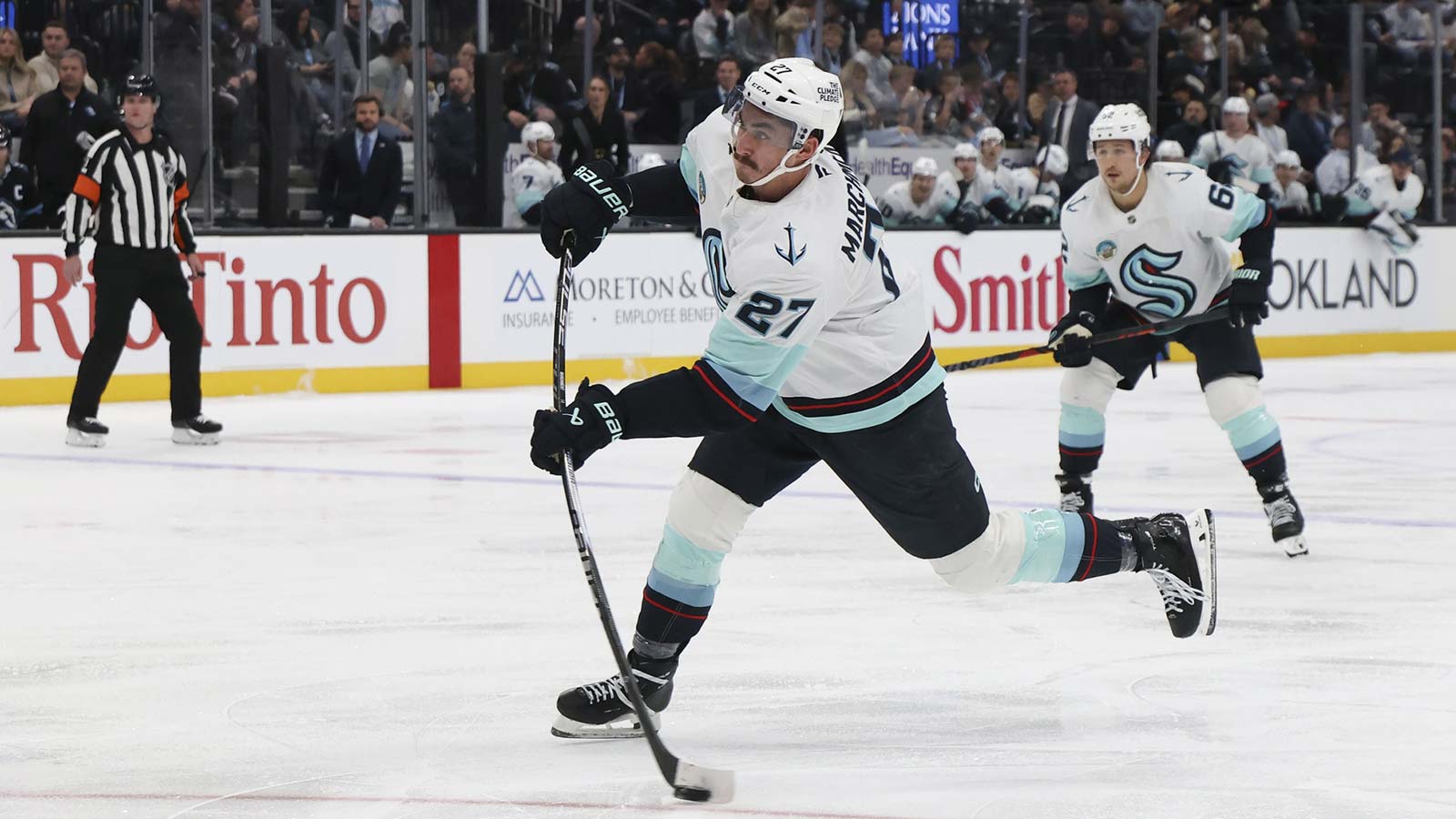 Seattle Kraken left wing Mason Marchment (27) reacts after scoring a goal against the Pittsburgh Penguins during the second period at PPG Paints Arena.