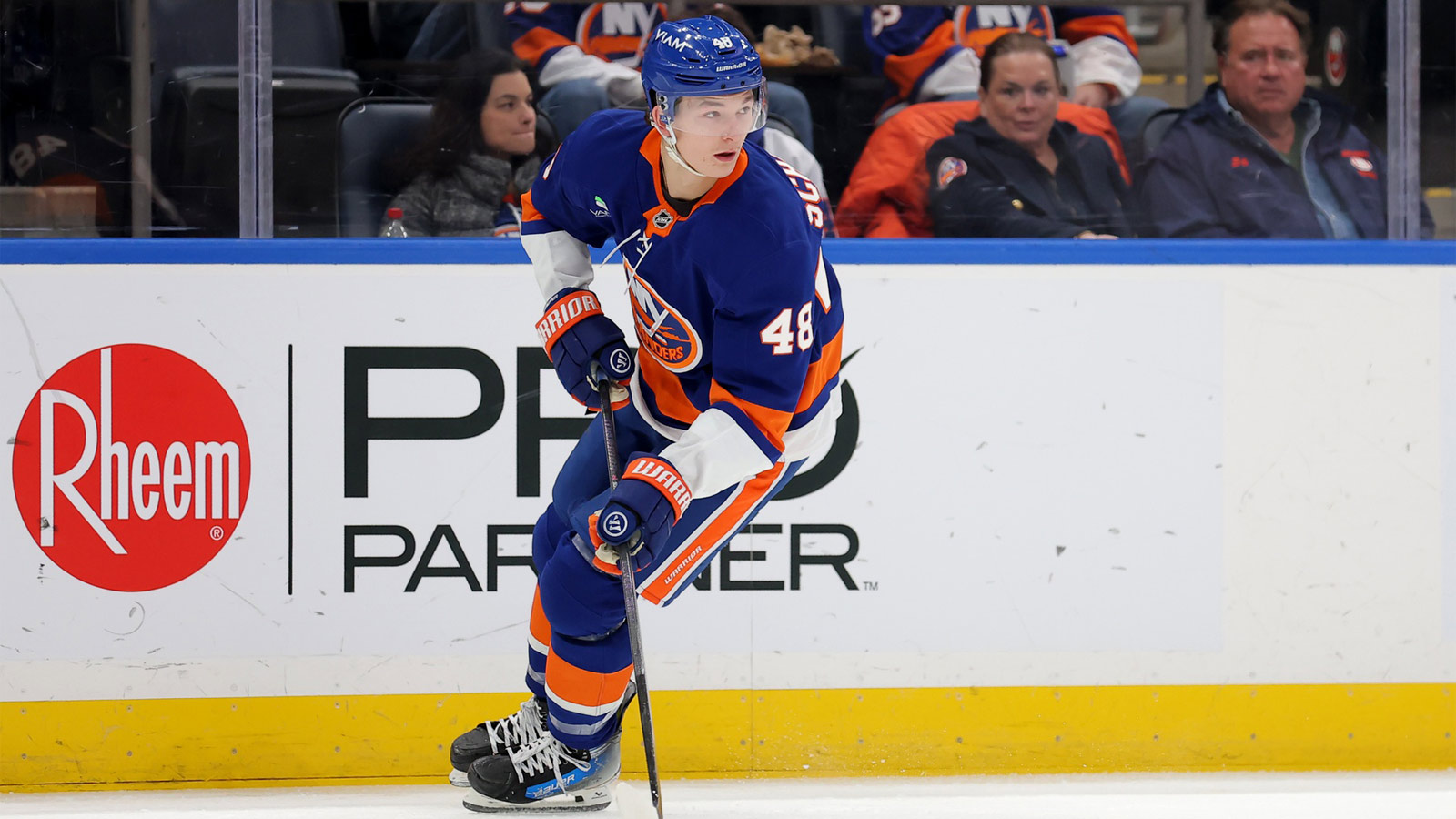 New York Islanders defenseman Matthew Schaefer (48) skates with the puck against the Tampa Bay Lightning during the first period at UBS Arena.
