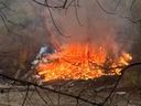 A fire consumed a riverbank encampment at Mostyn Place Park.