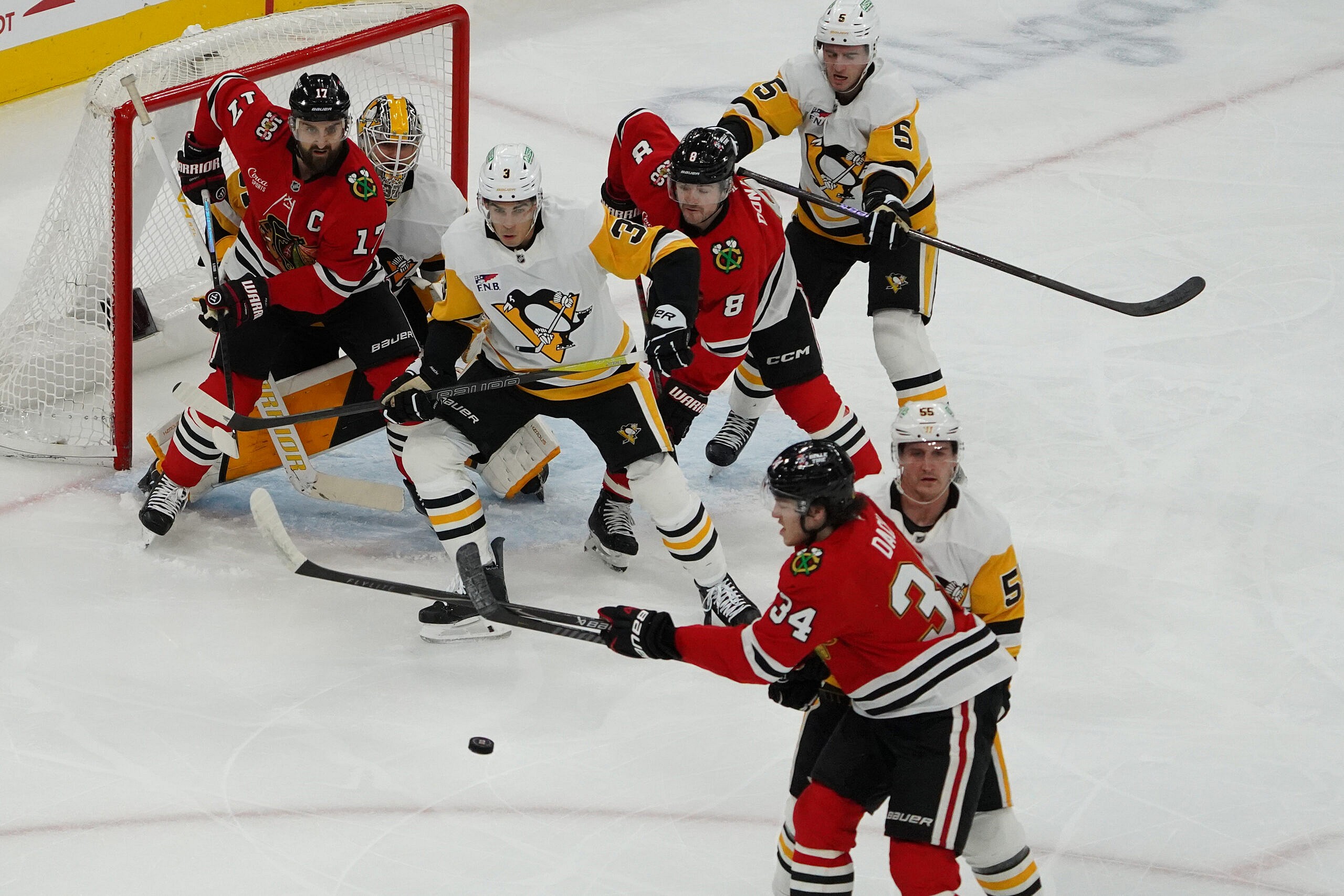 NHL: Pittsburgh Penguins at Chicago Blackhawks; Jack St. Ivany and Ryan Shea