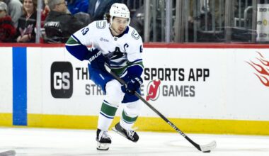 Late Devils GM Honor; Canucks Room Hearing Noise