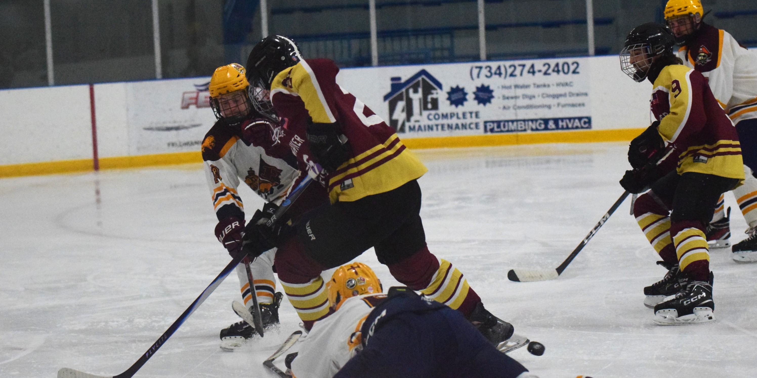The Riverview-Cabrini United ice hockey team used a big third...