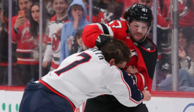 New Jersey Devils' Paul Cotter fights Brendan Smith in the second period of Monday's game against the Columbus Blue Jackets.