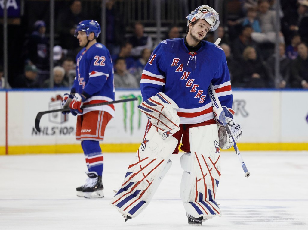 Rangers goaltender Igor Shesterkin reacts on the ice in the second period at Madison Square Garden .