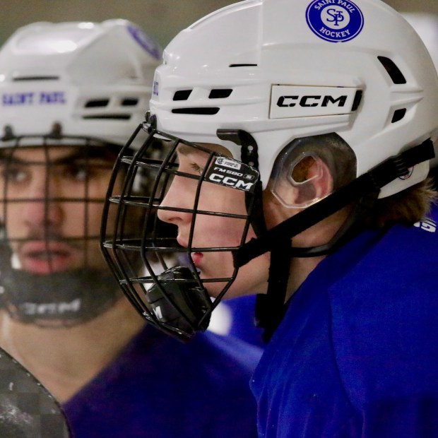 Hockey player wearing helmet