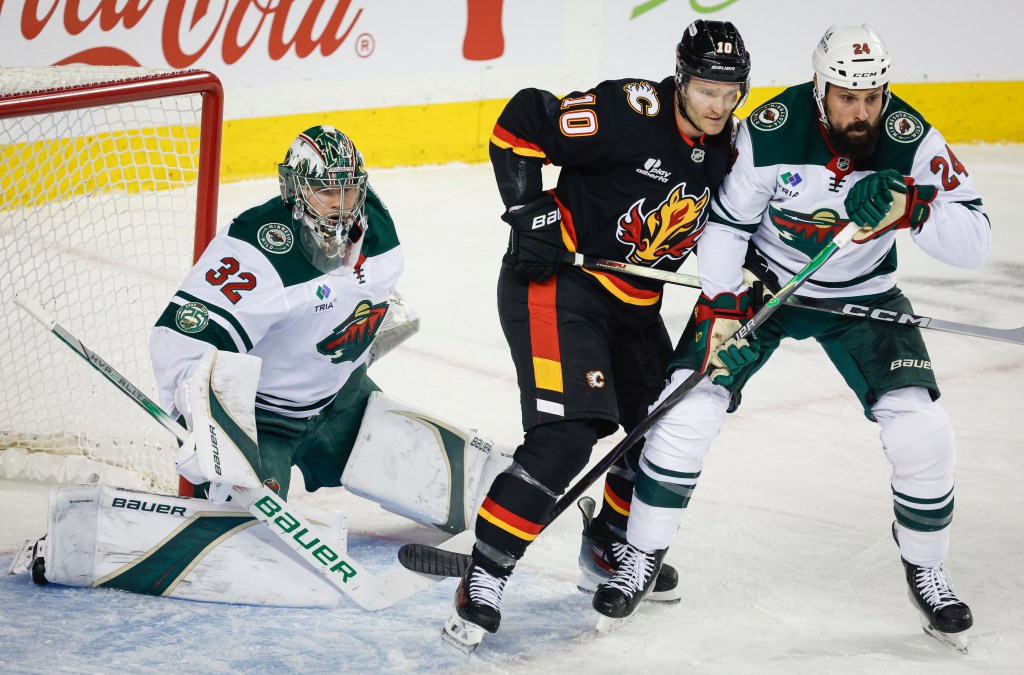 Flames dominate late to douse Wild point streak – Twin Cities