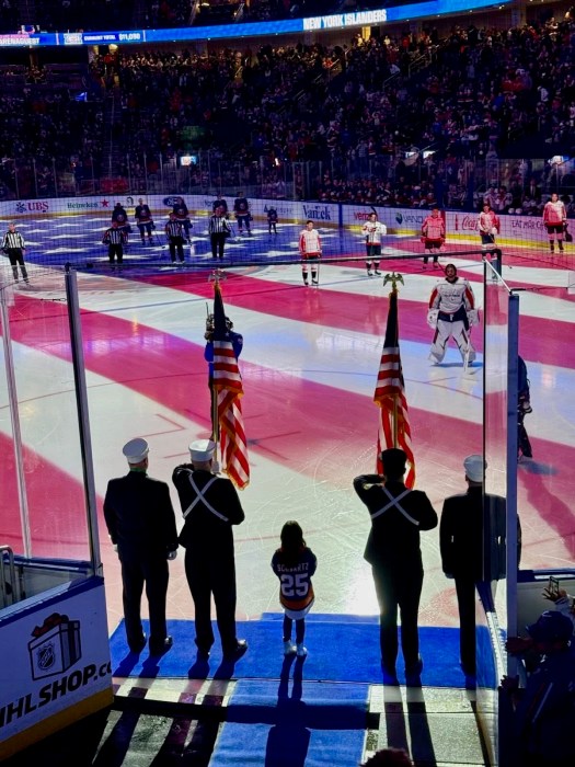 Samantha singing the national anthem.