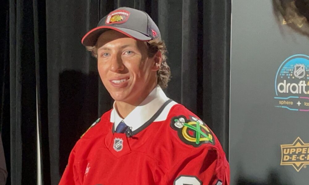 AJ Spellacy addresses the media after being drafted by the Chicago Blackhawks at the 2024 NHL Draft.