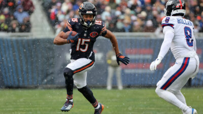 Nov 9, 2025; Chicago, Illinois, USA; Chicago Bears wide receiver Rome Odunze (15) makes a catch against New York Giants safety Jevon Holland (8) during the first half at Soldier Field.