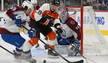 Colorado Avalanche defenseman Samuel Girard (49) and Philadelphia Flyers right wing Matvei Michkov (39) battle for the puck in front of goaltender Mackenzie Blackwood (39) during the first period at Xfinity Mobile Arena. Mandatory Credit: Eric Hartline-Imagn Images