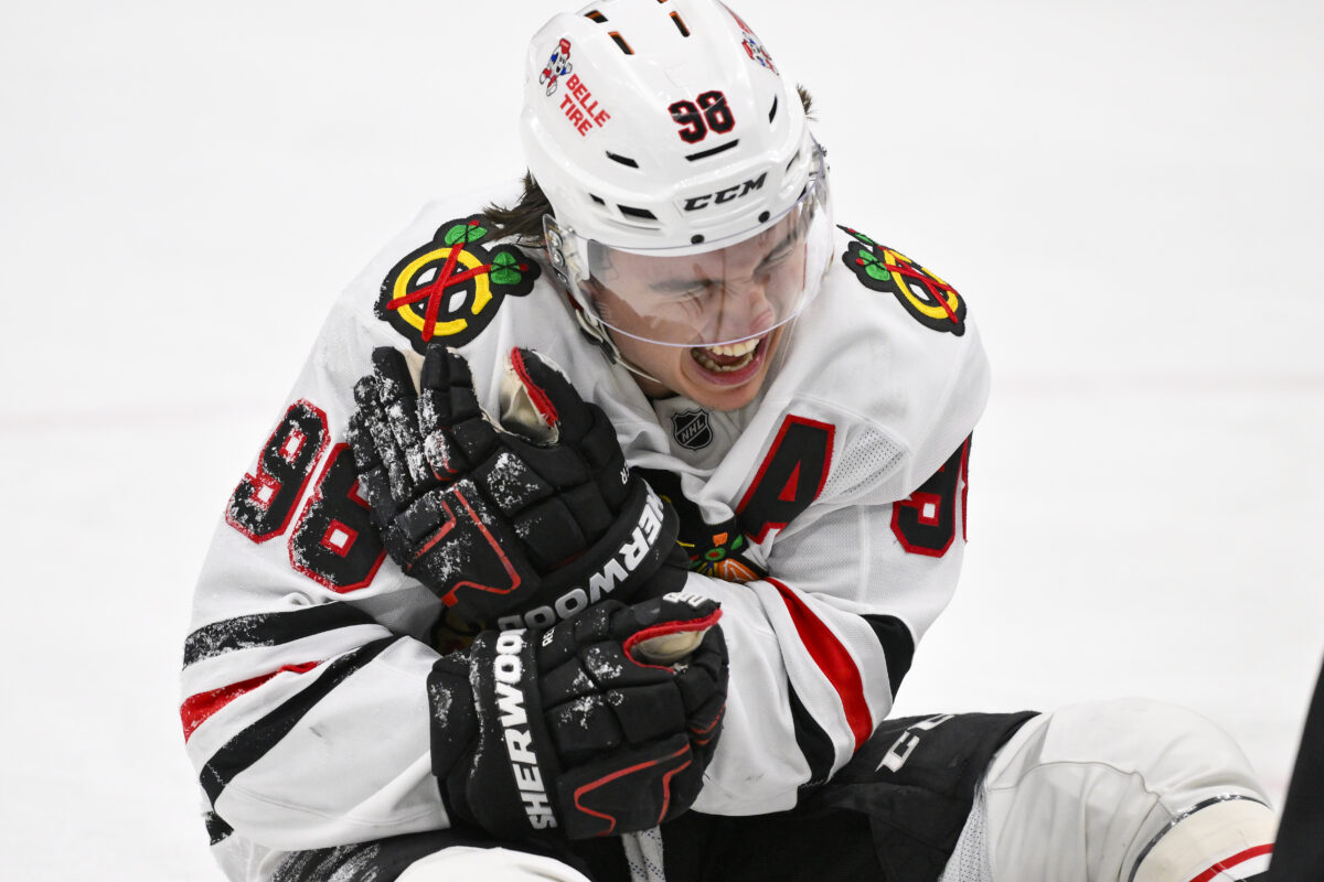 Dec 12, 2025; St. Louis, Missouri, USA; Chicago Blackhawks center Connor Bedard (98) reacts in pain after a face off against St. Louis Blues center Brayden Schenn (not pictured) during the third period at Enterprise Center.