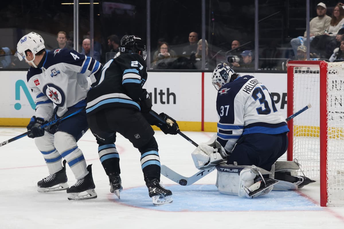 Jets rally from three-goal hole to steal a point