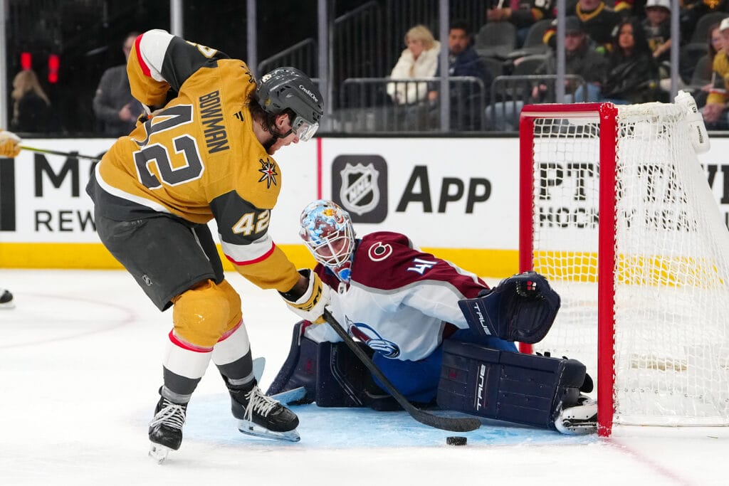 Colorado Avalanche goaltender Scott Wedgewood (41) makes a save against Vegas Golden Knights right wing Braeden Bowman (42) during the second period at T-Mobile Arena. Mandatory Credit: Stephen R. Sylvanie-Imagn Images