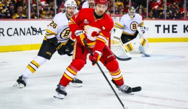 Flames grind out overtime win over Bruins